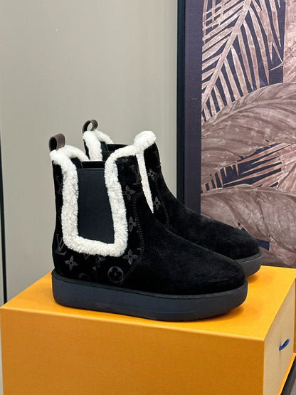 ASPEN CHELSEA ANKLE BOOTS IN BLACK MONOGRAM-DEBOSSED SUEDE