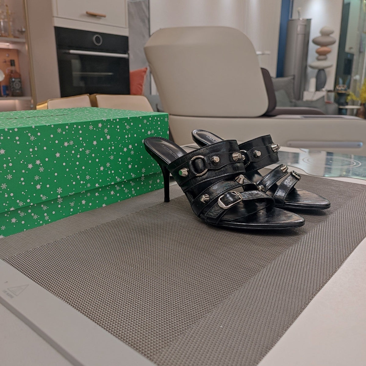 STRAPPY HIGH-HEELED SANDALS IN BLACK STUDDED WAX-OIL SHEEPSKIN